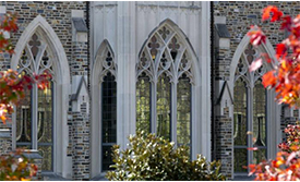 Arched windows with fall leaves, Duke Divinity School